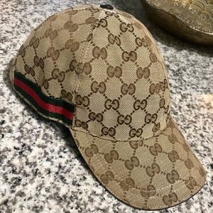 Authentic Gucci monogram cap. ( Unisex) Adjustable leather closure in back.
